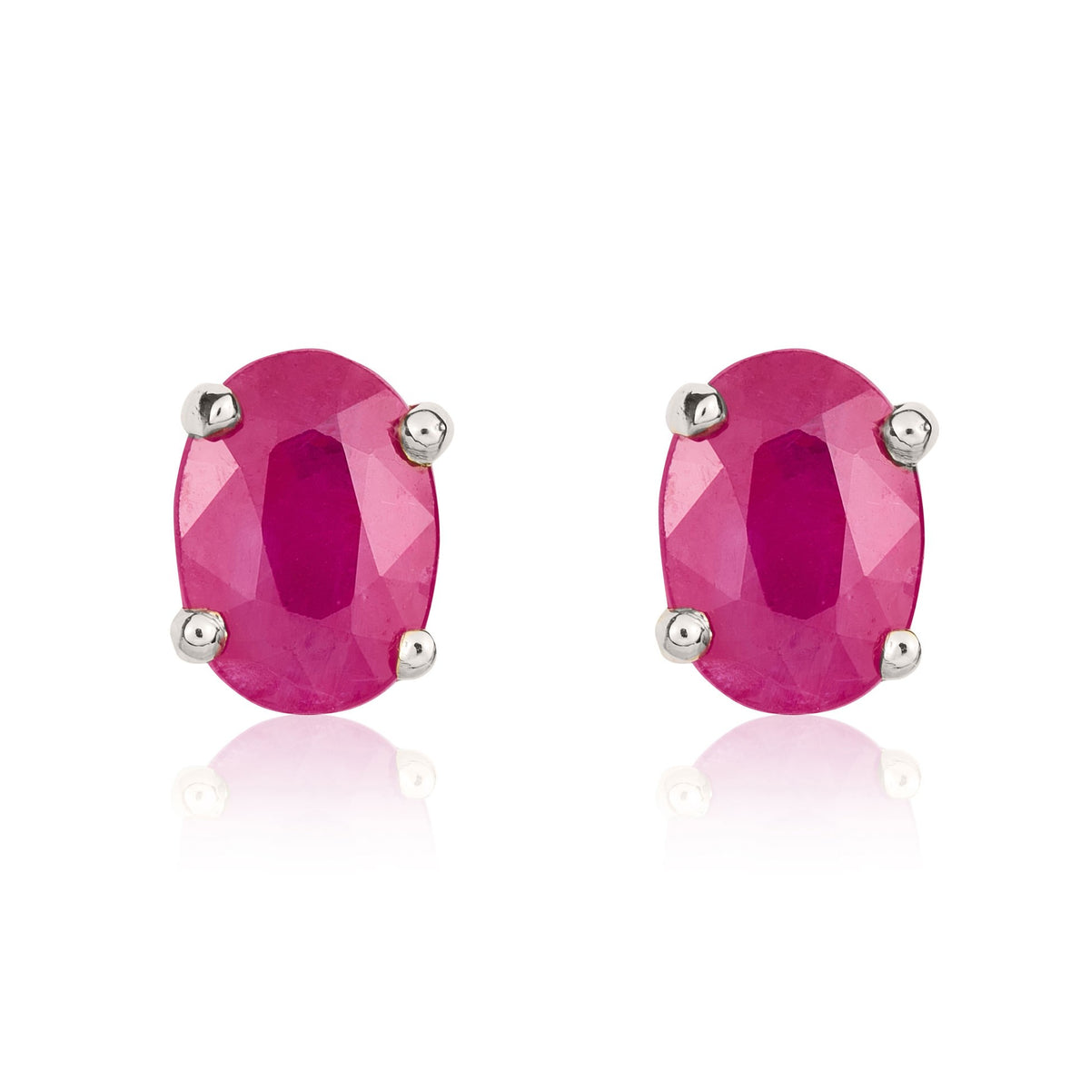 9CT WG 7X5MM OVAL RUBY CLAW EARRINGS