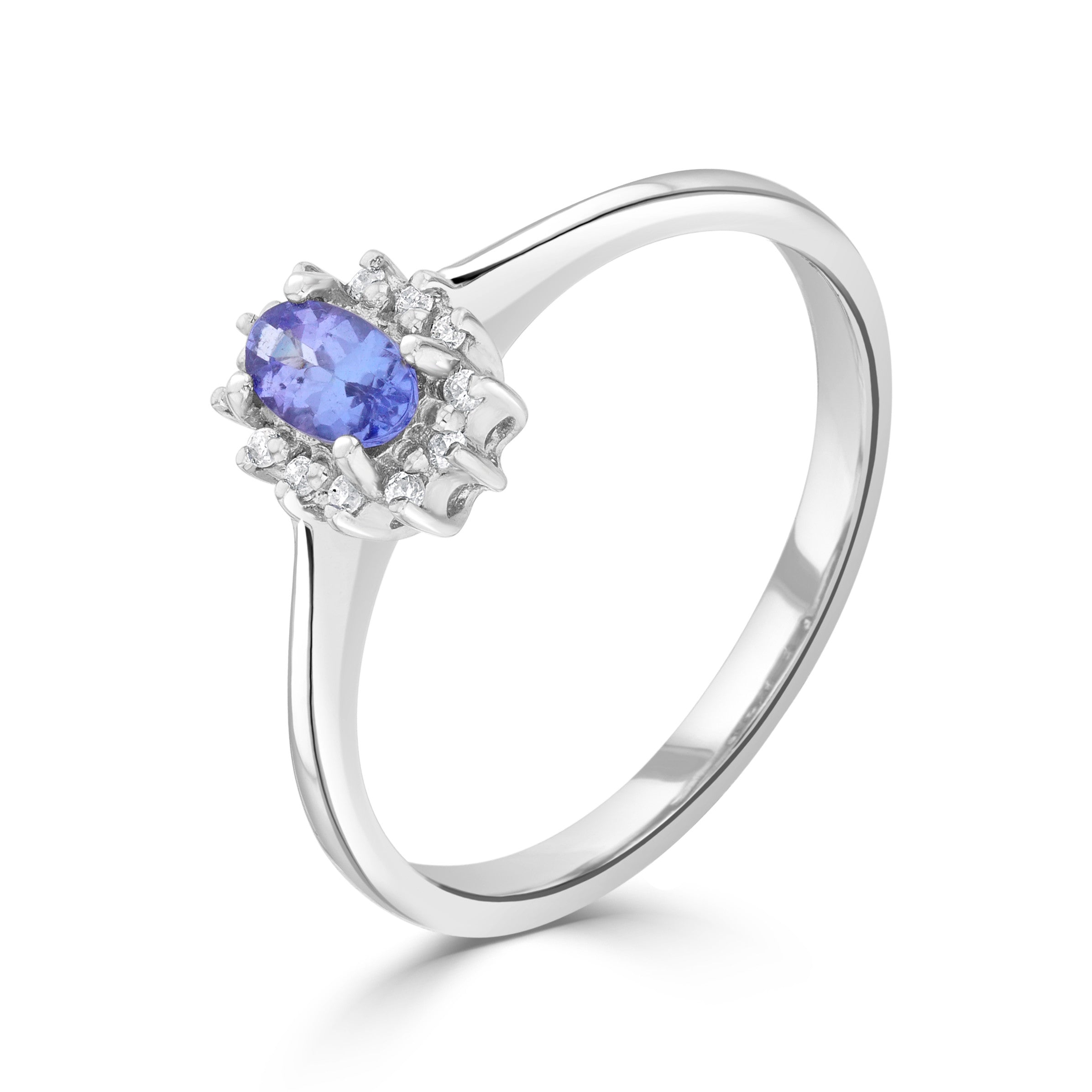 9CT WG 5X3 OVAL TANZANITE & DIAMOND CLAW SET CLUSTER RING