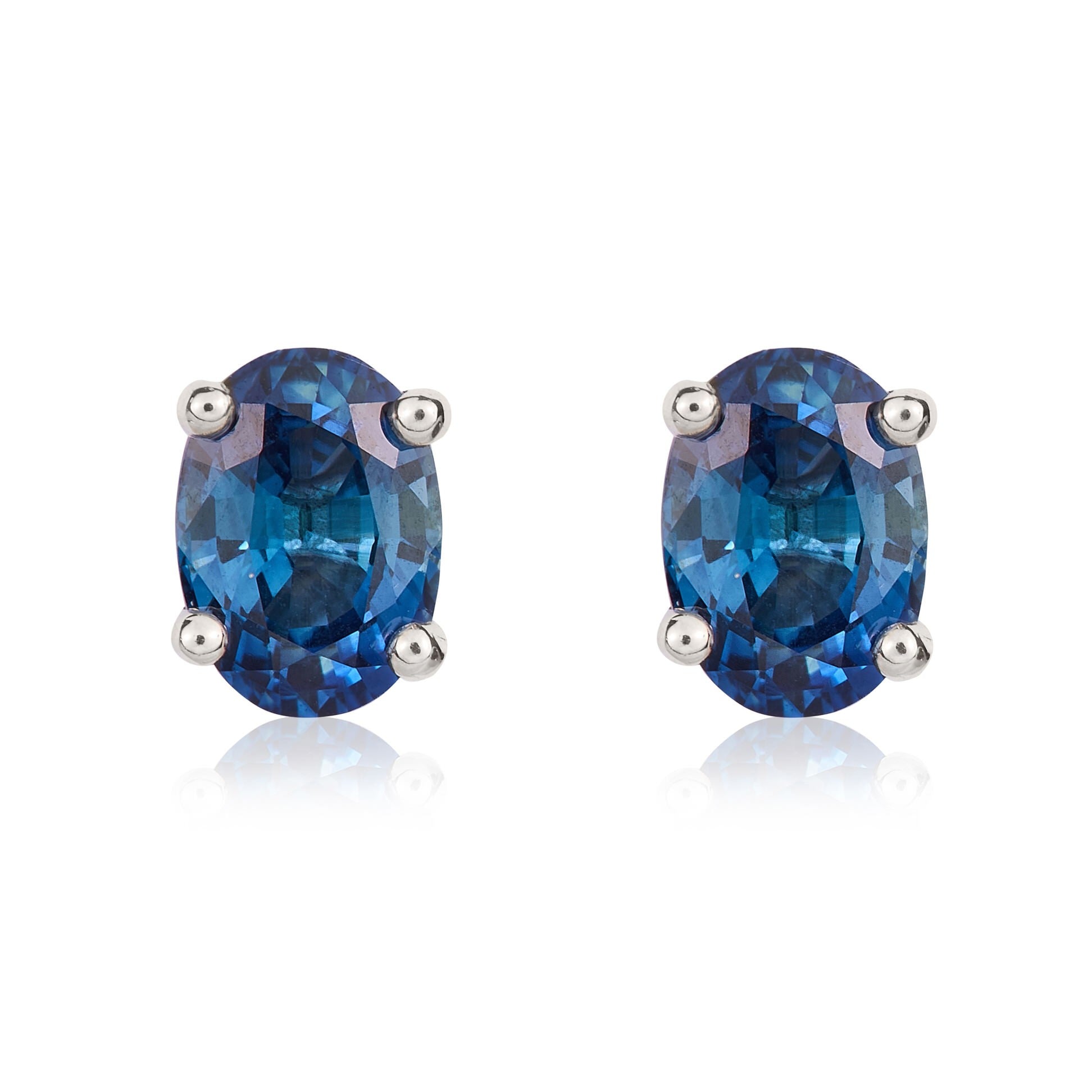 9CT WG 7X5MM OVAL SAPPHIRE CLAW EARRINGS