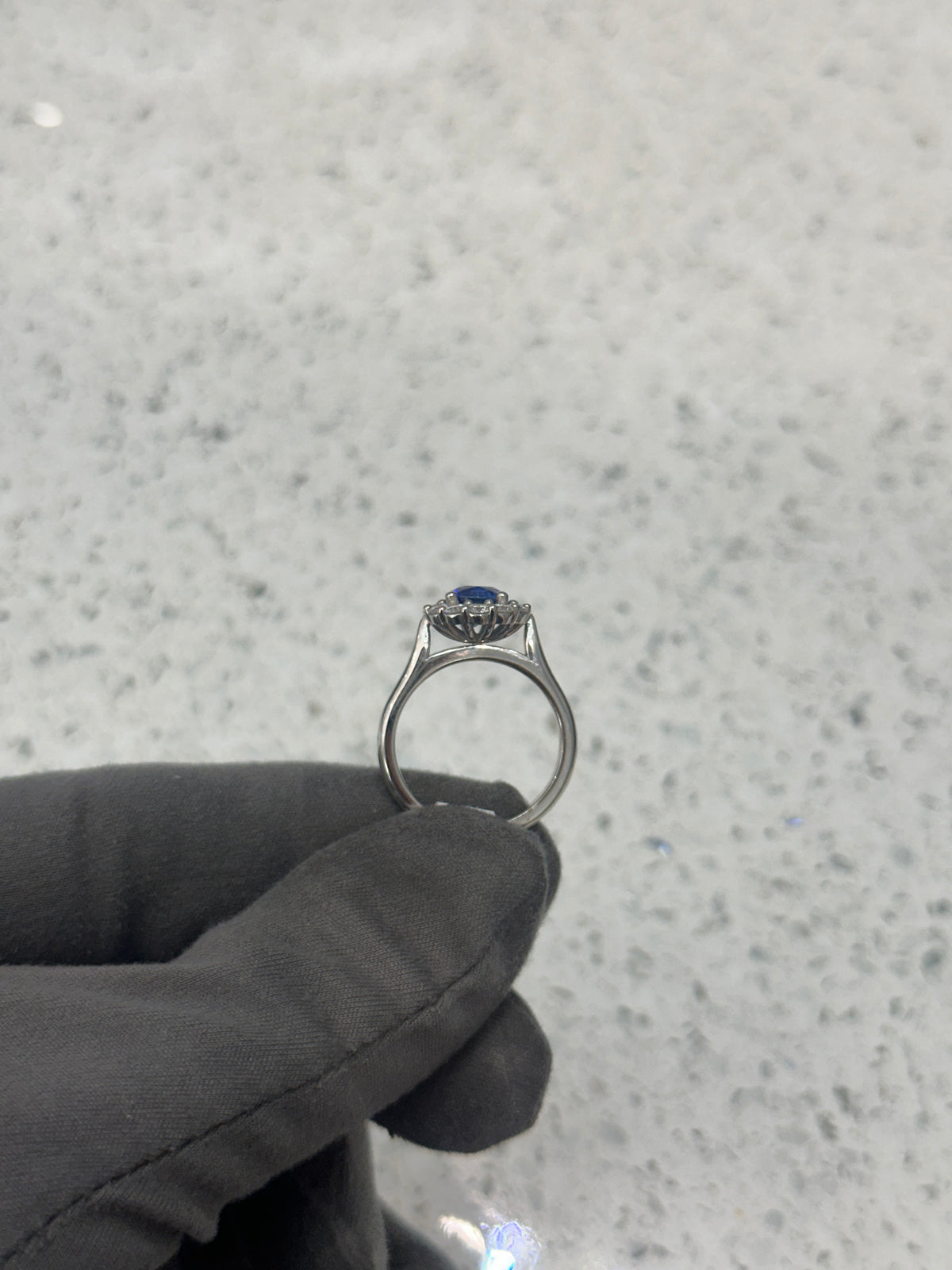 Platinum Blue Oval Sapphire & Diamond Halo Ring