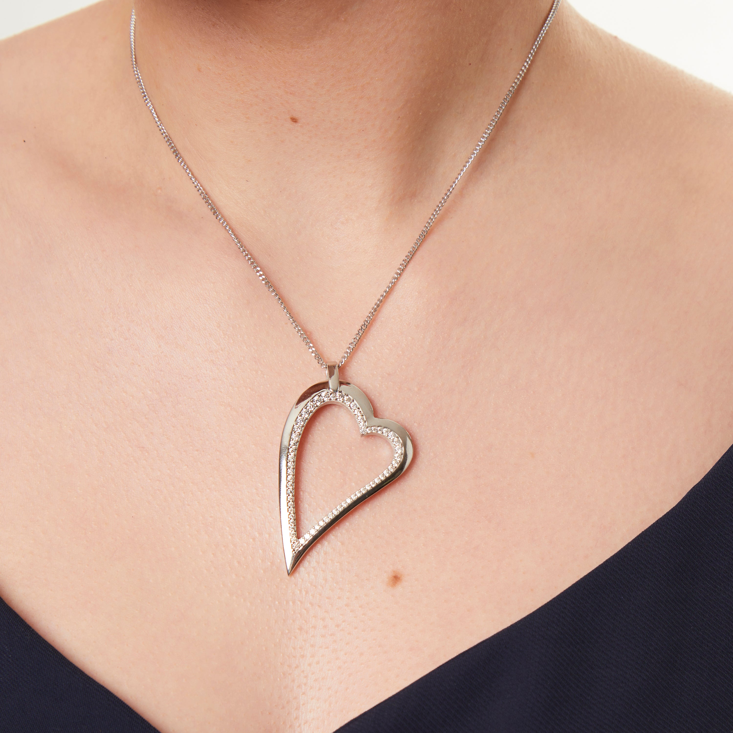 Sterling Silver Dali Heart Trimmed With Cubic Zirconias