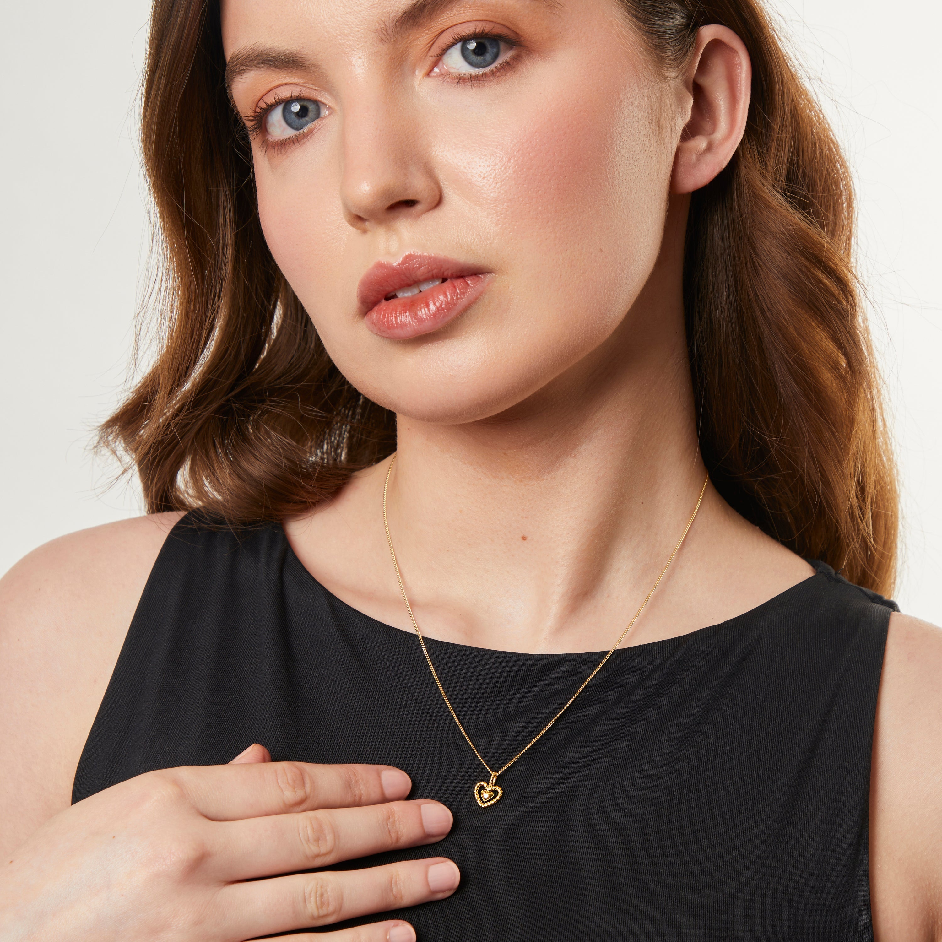 Heart Pendant With A Woven Surround