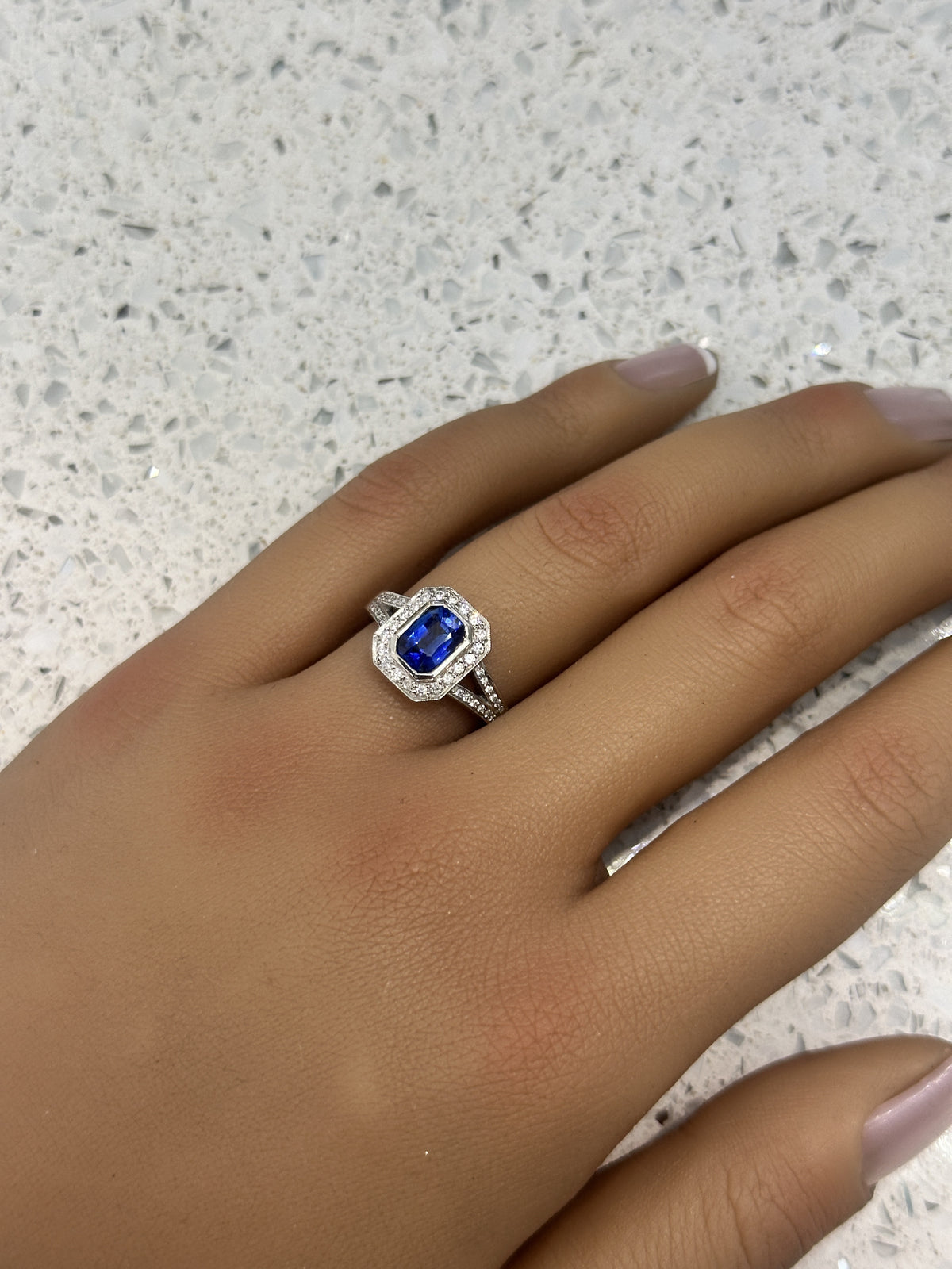 Platinum Blue Emerald cut Sapphire & Diamond Halo Split Shank Ring