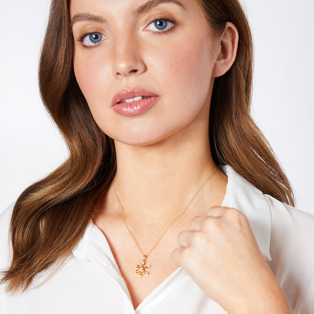 Yellow Gold Snowflake Pendant With Seven Cubic Zirconia Stones