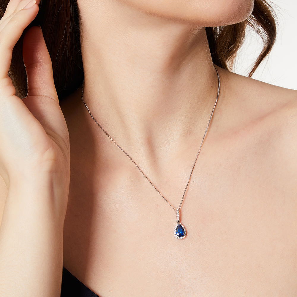 Sterling Silver Pear Cut Sapphire Blue Necklace with CZ Halo