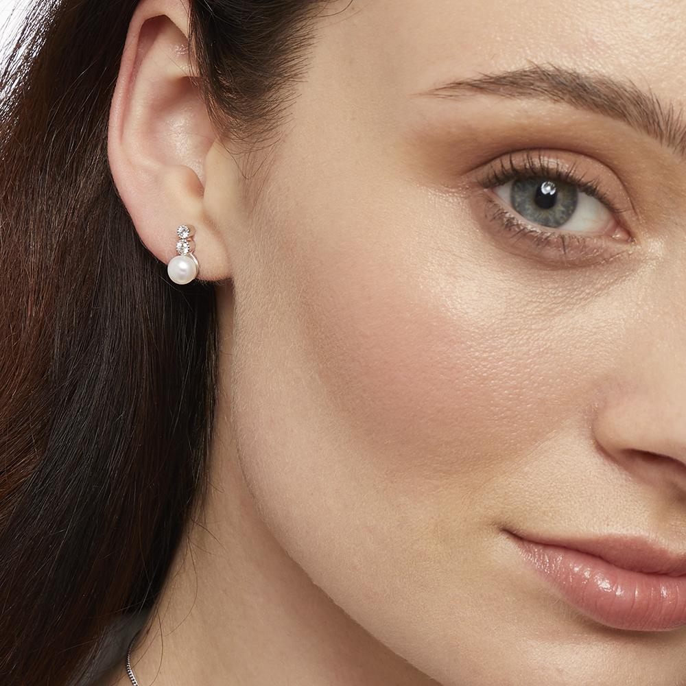 Sterling Silver Pearl Earrings Set With Two White Zirconia Stones