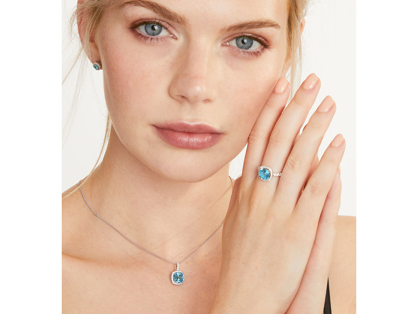 Sterling Silver Turquoise Zirconia Halo Stud Earrings
