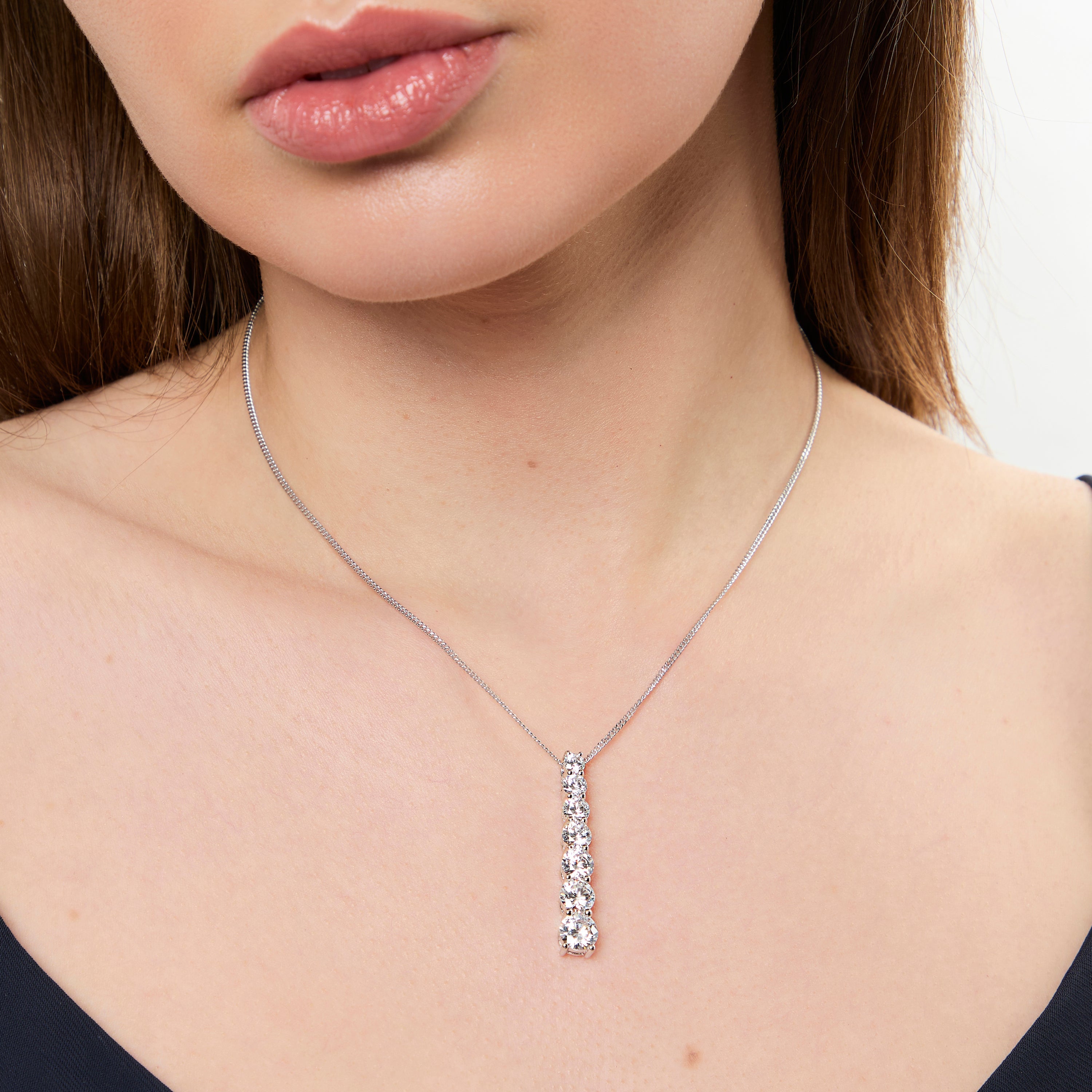 Sterling Silver Pendant With Graduated Cubic Zirconia Stones