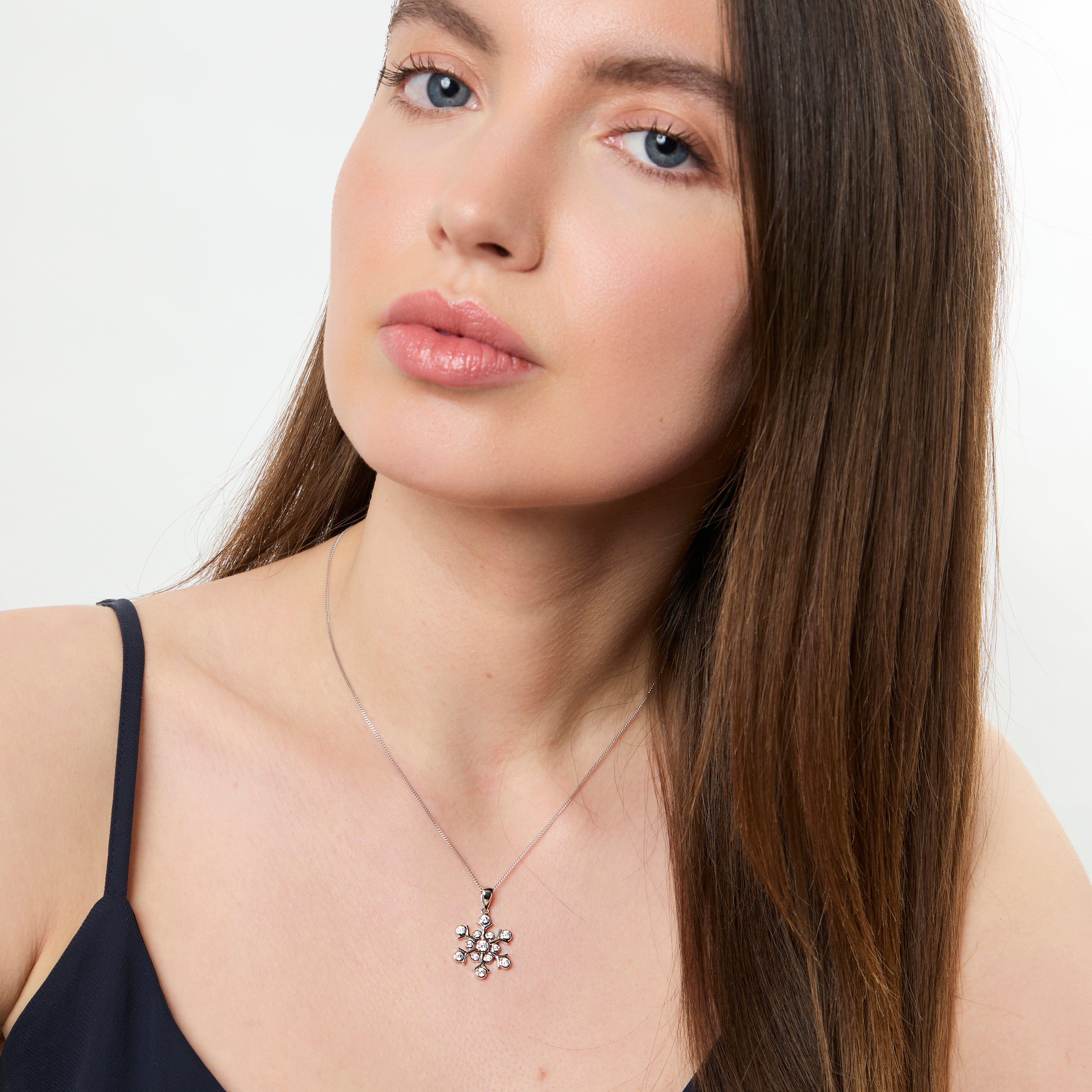 Sterling Silver Rubset Cubic Zirconia Snowflake Pendant