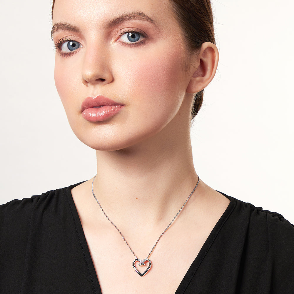 Sterling Silver Overlapping Heart Pendant With Cubic Zirconias