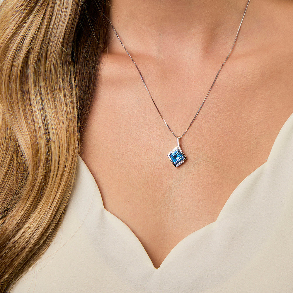 Sterling Silver Blue Topaz Cubic Zirconia Pendant