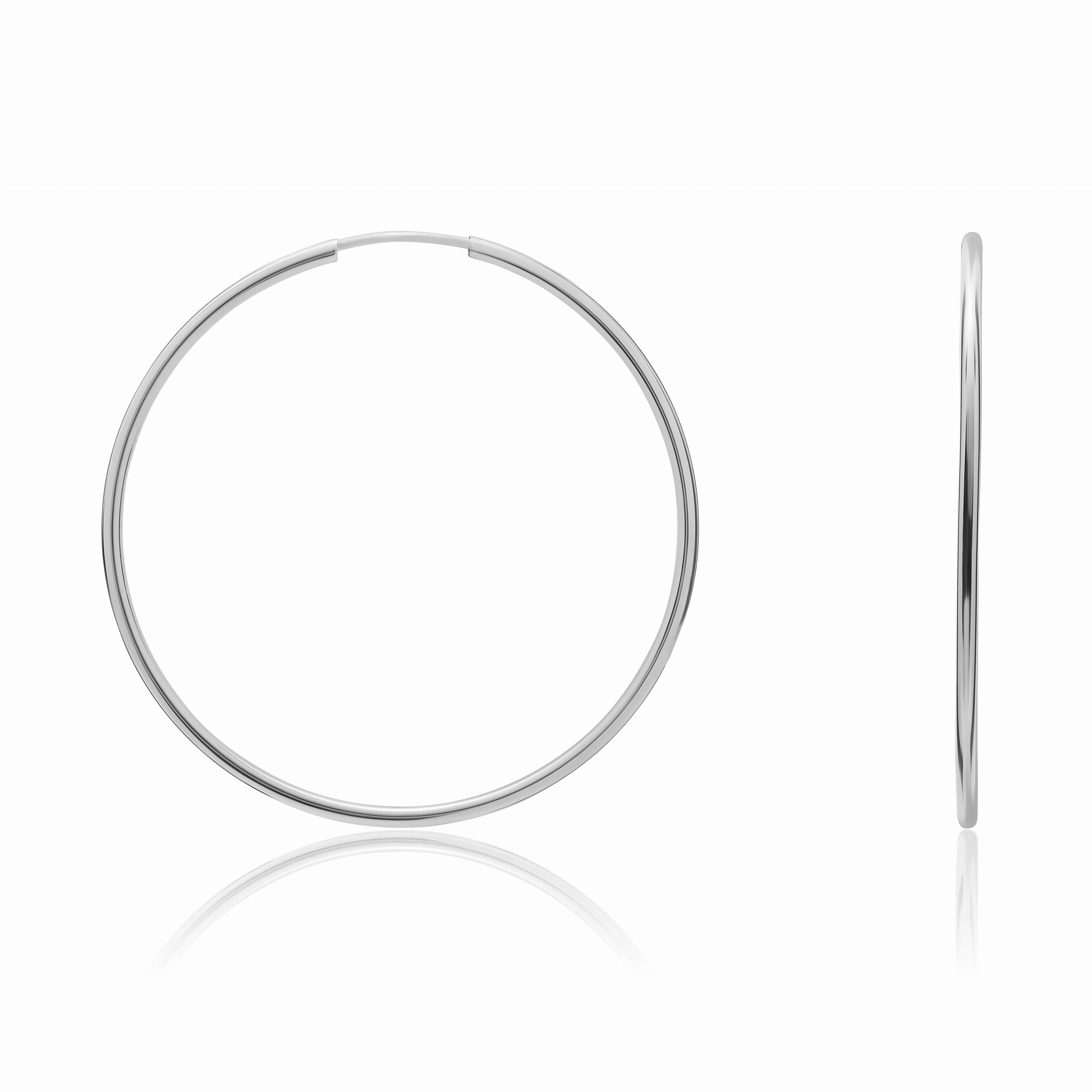 9CT WHITE GOLD THIN SLEEPER HOOP EARRINGS. 63MM DIAMETER