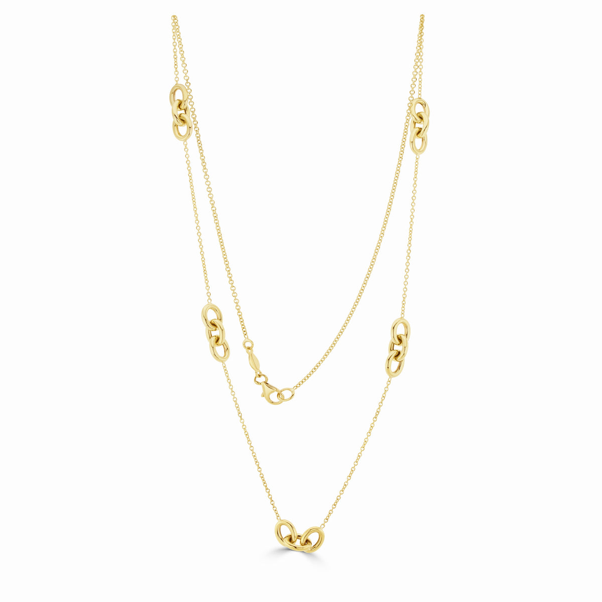 9CT YG CHAIN AND TRIPLE OVAL LINK NECKLACE. 18 INCH