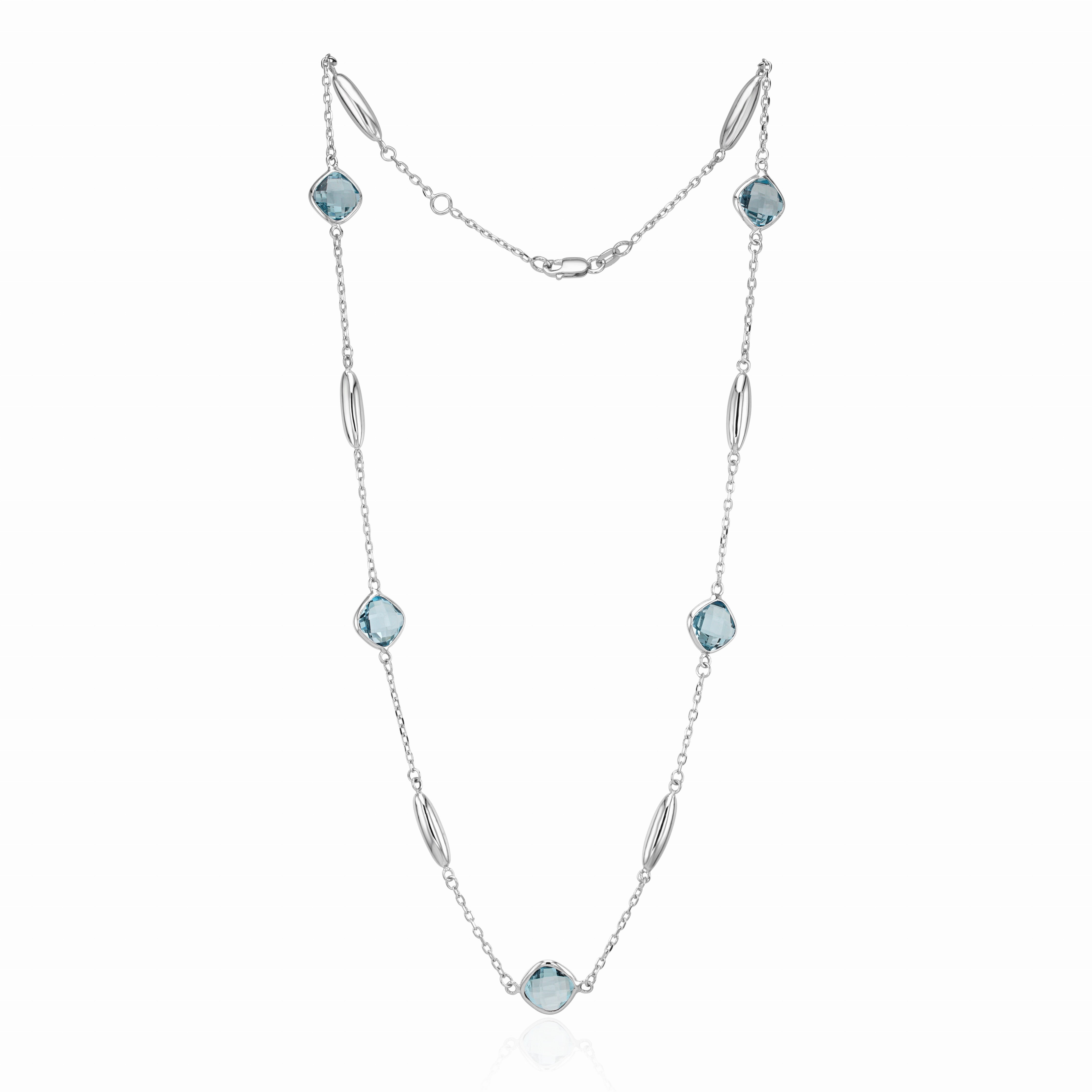 9CT WHITE GOLD CHECKERBOARD CUSHION BLUE TOPAZ, POLISHED TORPEDO MOTIF AND CHAIN NECKLACE