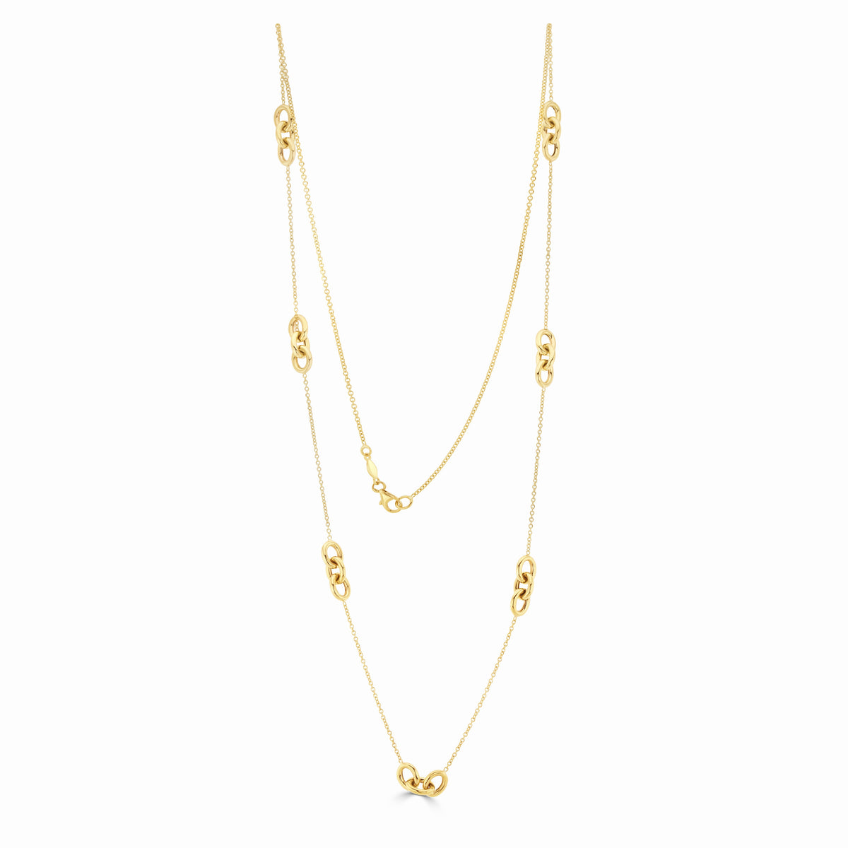 9CT YG CHAIN AND TRIPLE OVAL LINK NECKLACE. 24 INCH