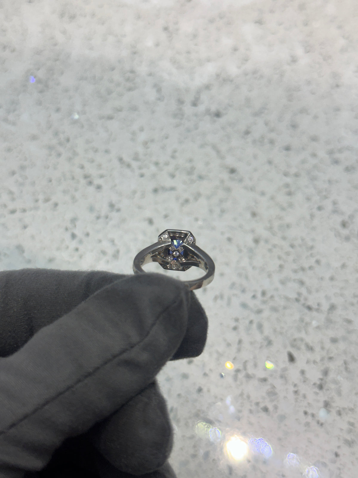 Platinum Blue Emerald cut Sapphire & Diamond Halo Split Shank Ring