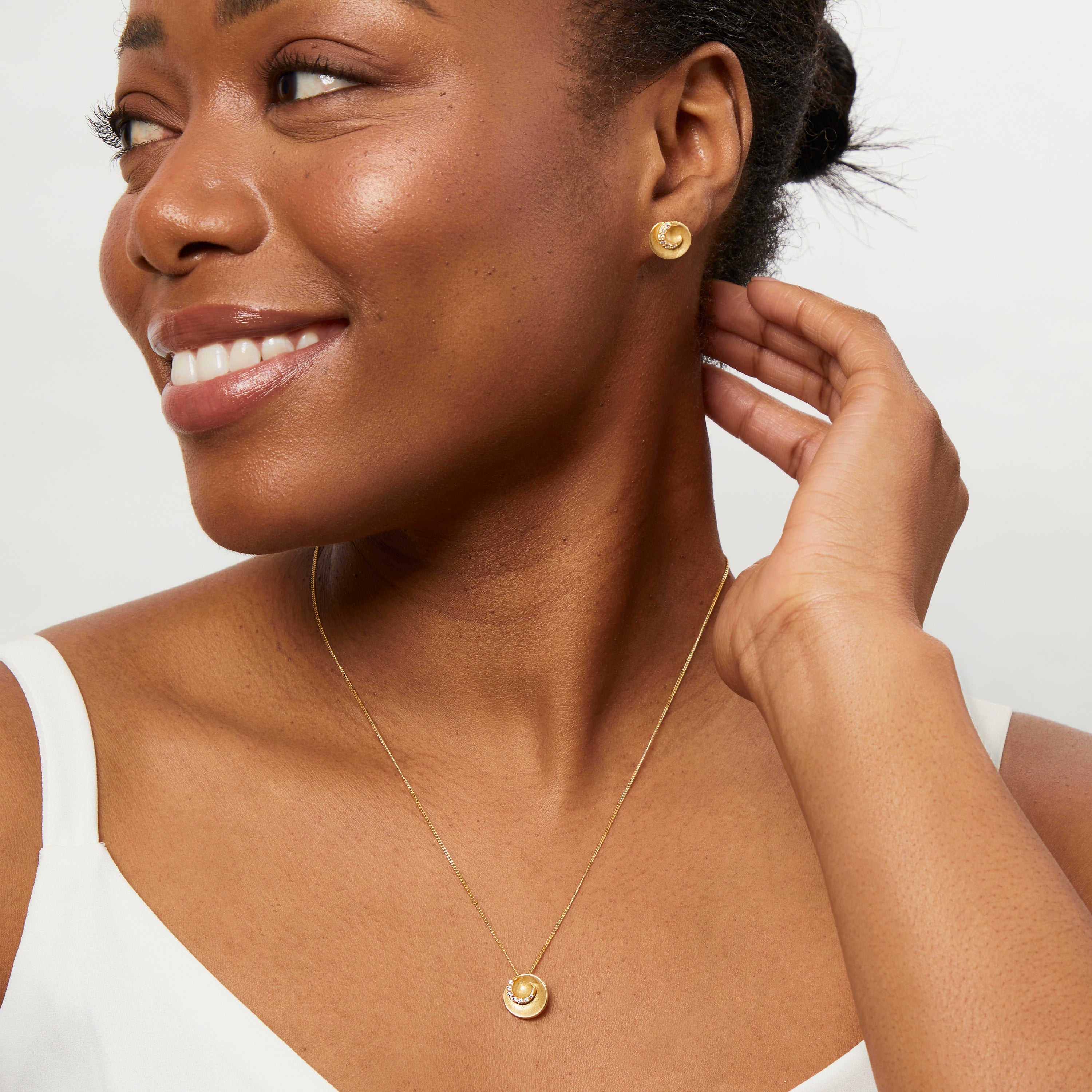 Yellow Gold Brushed Swirl Stud Earrings
