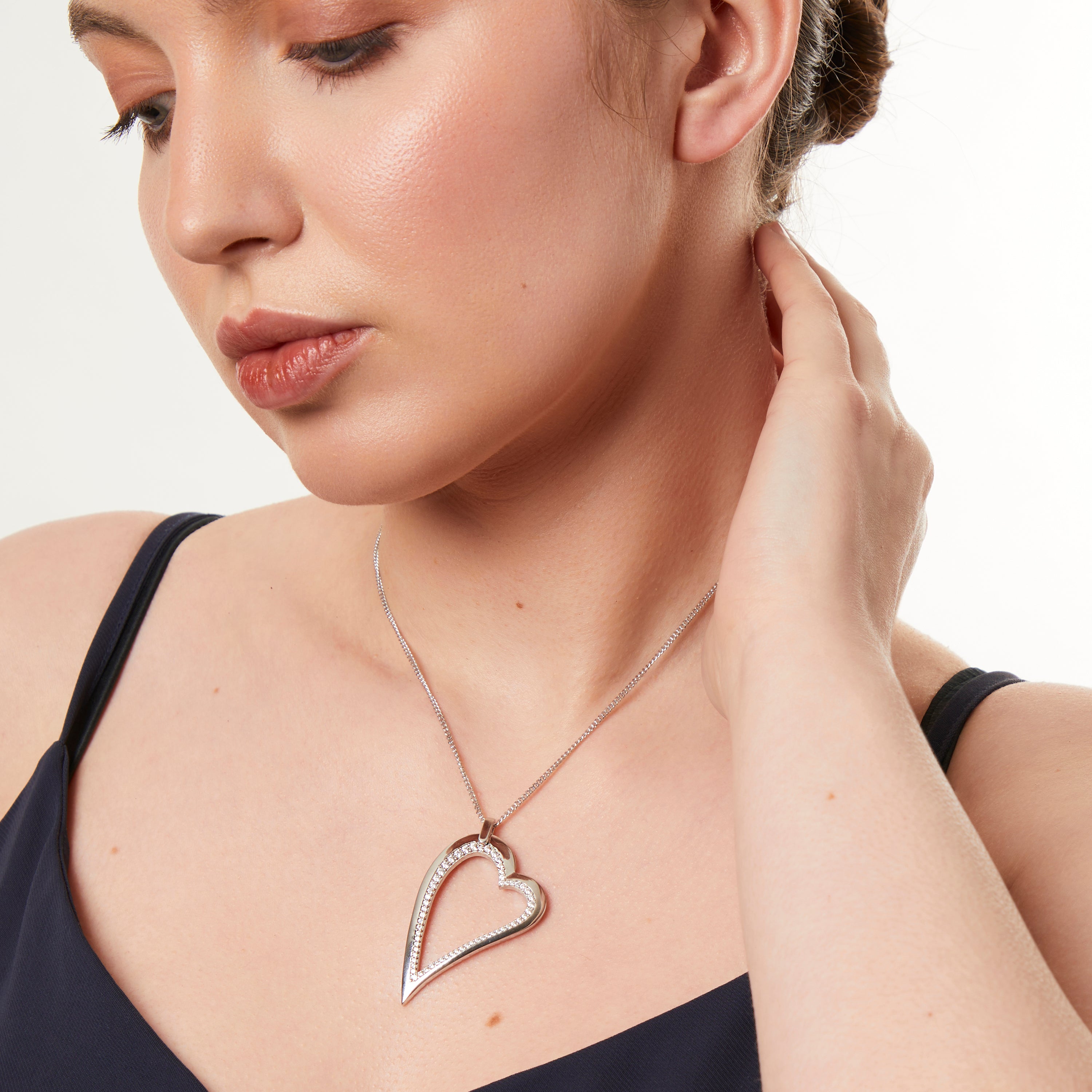 Sterling Silver Dali Heart Trimmed With Cubic Zirconias