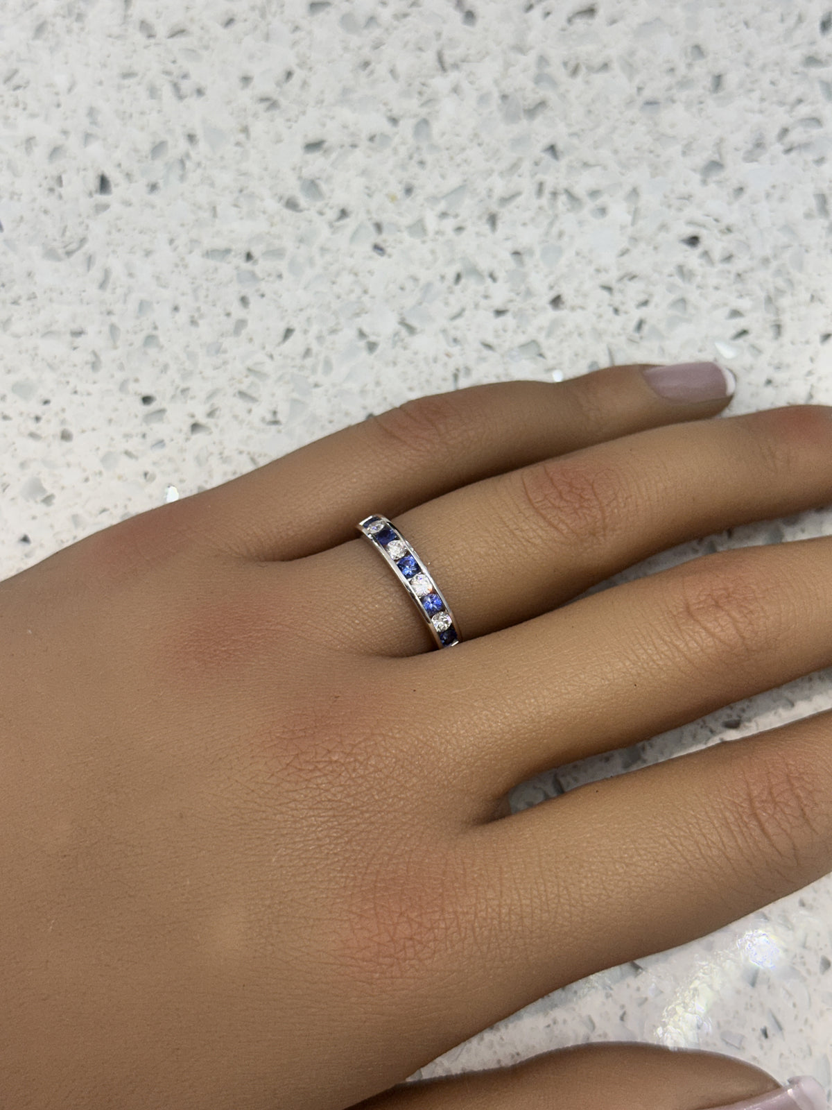 18CT WHITE GOLD SAPPHIRE & DIAMOND HALF ETERNITY RING CHANNEL SET