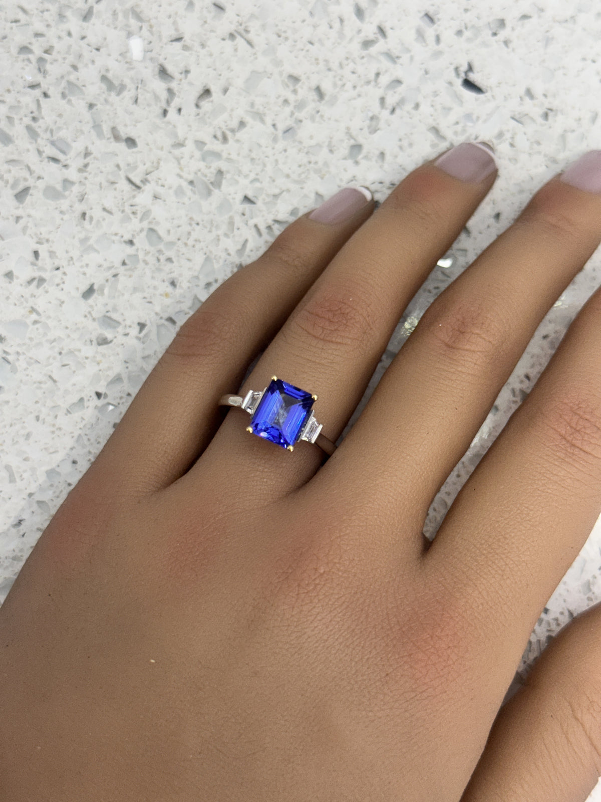 Platinum and 18ct yellow gold rectangular Tanzanite and diamond trapizoid Trilogy/3 Stone Ring