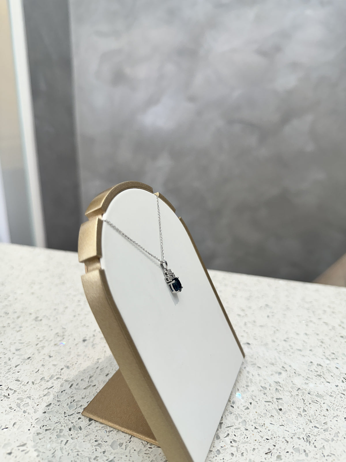 9ct White Gold Oval Sapphire and Diamond Pendant