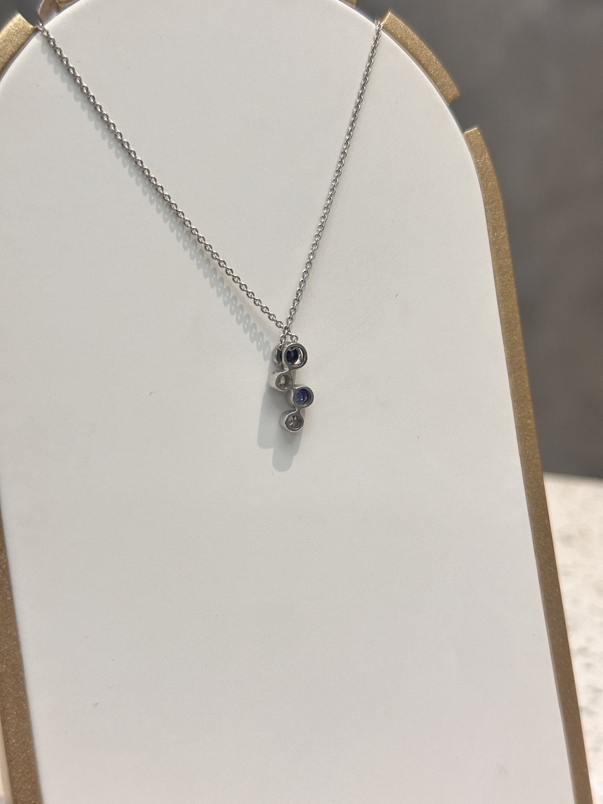 9ct White Gold Sapphire & Diamond Round 4 stone drop pendant
