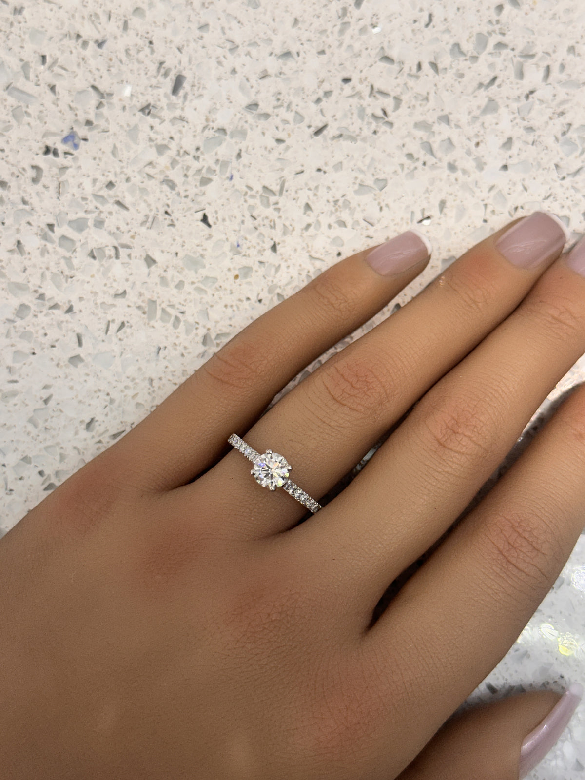 Platinum Round Brilliant 0.80ct Diamond Engagement Ring with diamond set shoulders