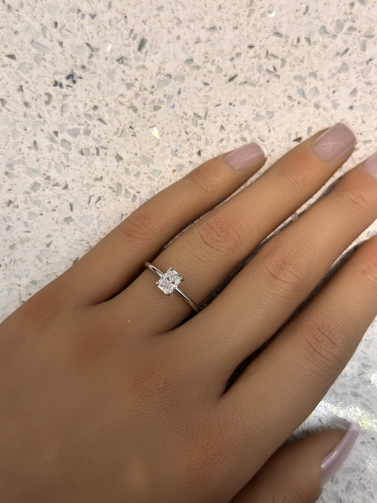Platinum 0.70ct rectangular modified brilliant cut Diamond Engagement Ring