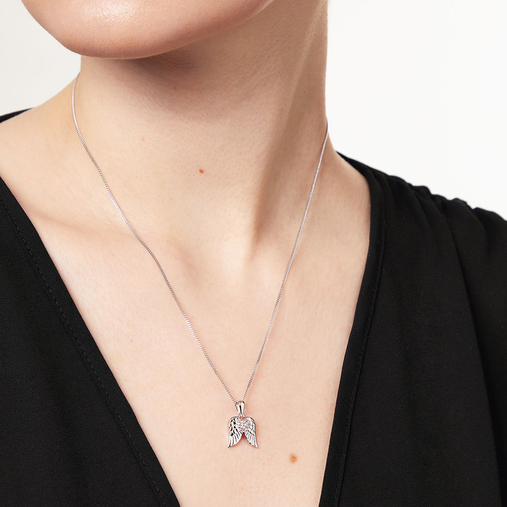 Sterling Silver Wing Pendant Set With A Cubic Zirconia Heart Centre