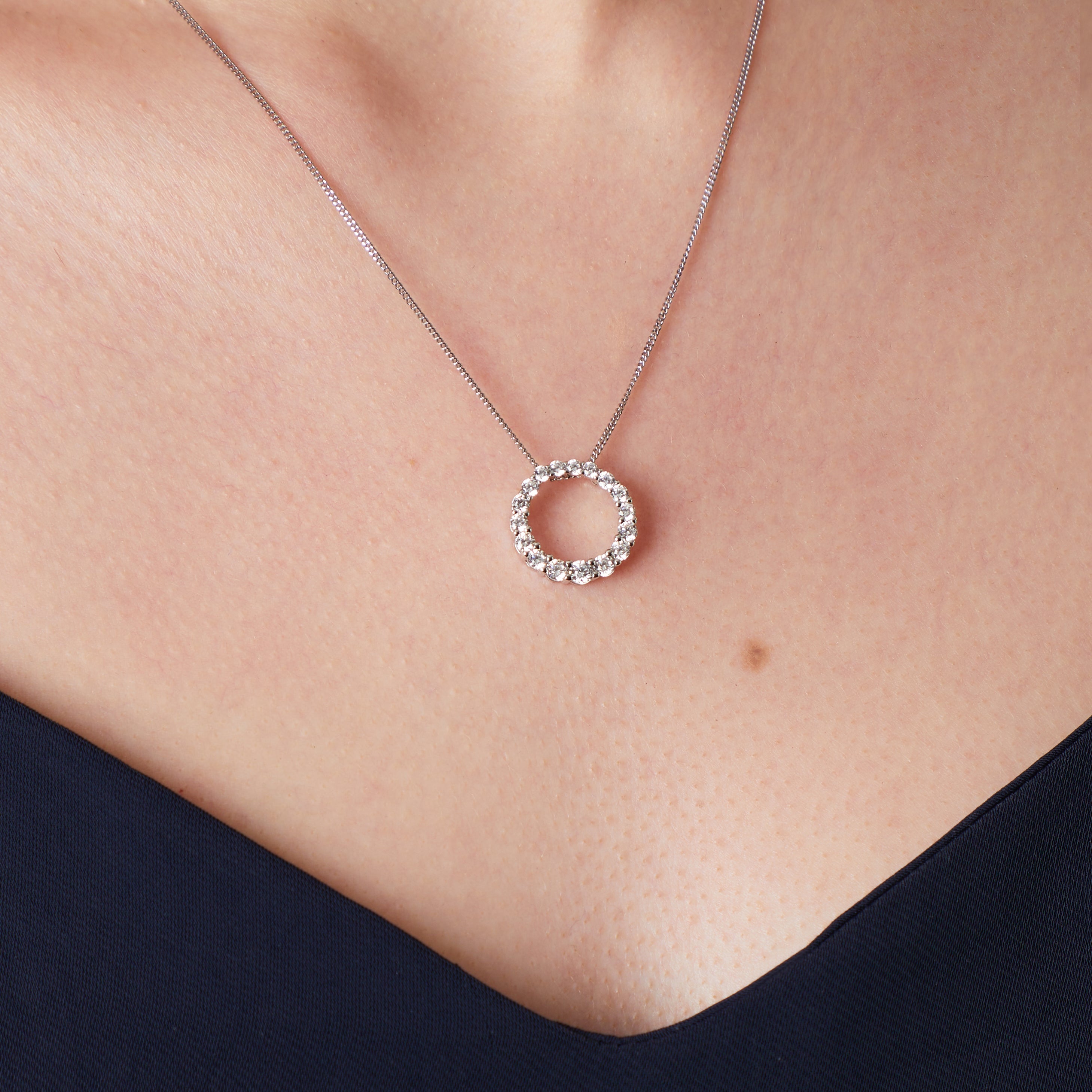 Sterling Silver Encrusted Circle With Cubic Zirconia