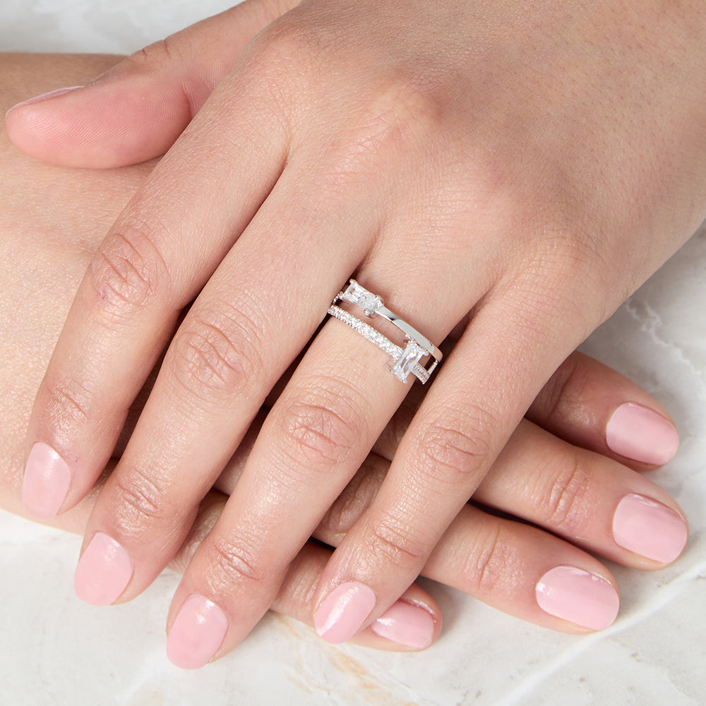 Sterling Silver Split Band Ring With Two Emerald Cut Stones