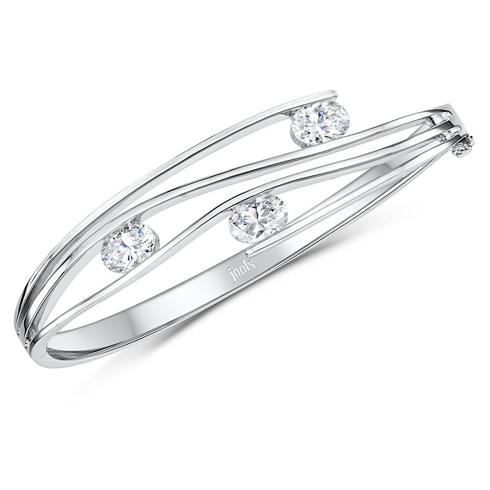 Sterling Silver Bangle  Set With Three Cubic Zirconia Oval Stones