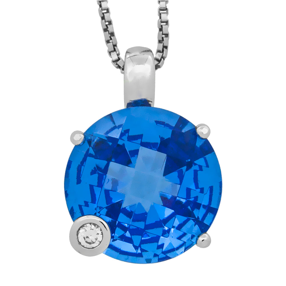 Sterling Silver Pendant Featuring Round Blue Topaz Stone In A Four Claw Setting