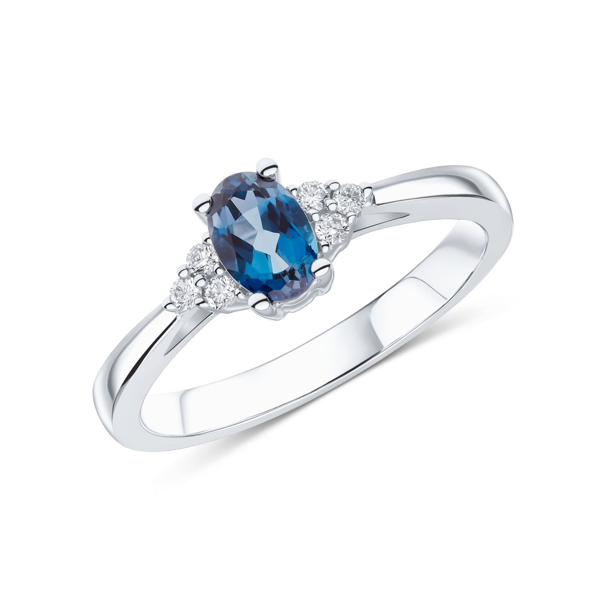 9CT WG 6X4 OVAL LONDON BLUE TOPAZ AND ROUND DIAMOND TREFOIL SHOULDERS RING