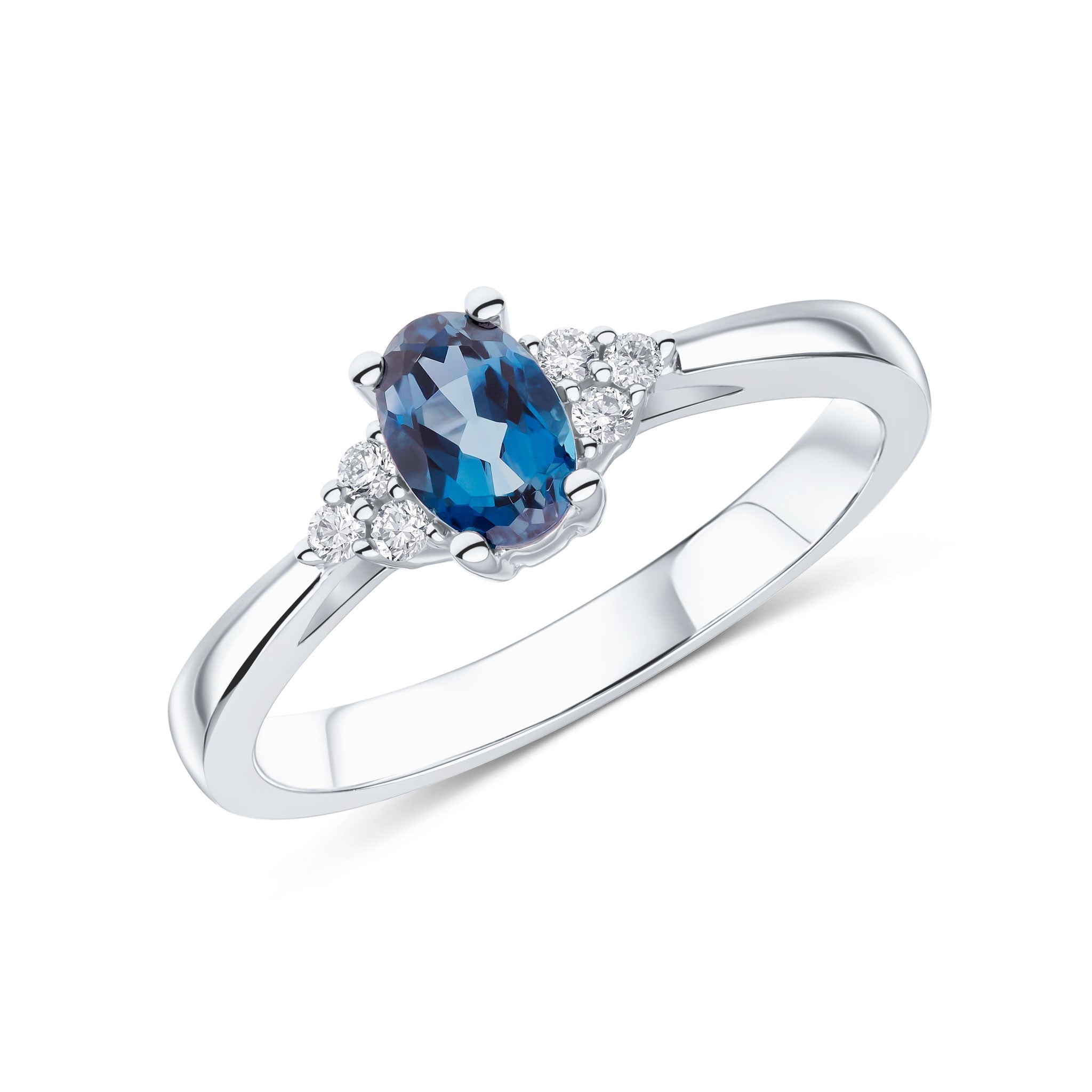 9CT WG 6X4 OVAL LONDON BLUE TOPAZ AND ROUND DIAMOND TREFOIL SHOULDERS RING