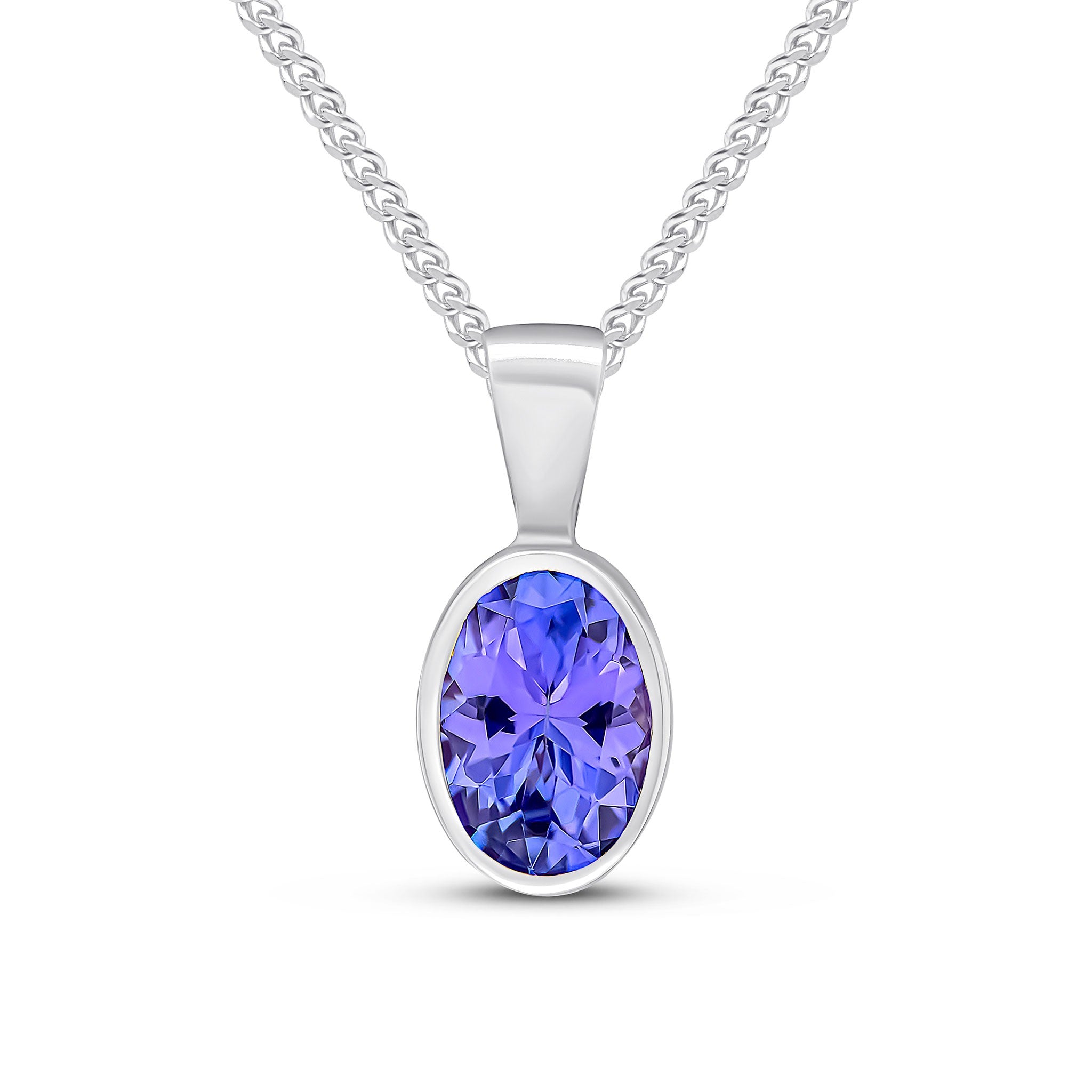 9CT WG 7X5 OVAL TANZANITE RUBOVER PENDANT
