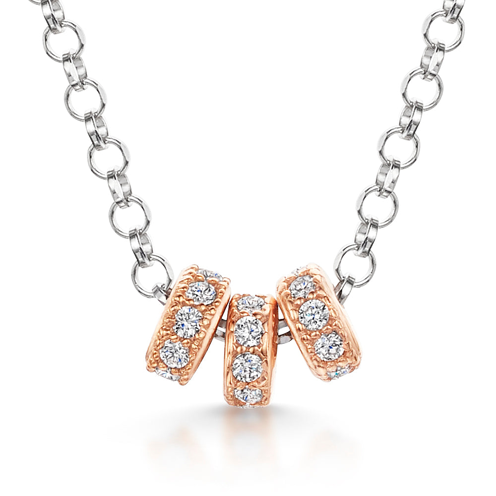 Sterling Silver Necklace With Three Rose Gold And Silver Rings Set With White Cubic Zirconia Stones
