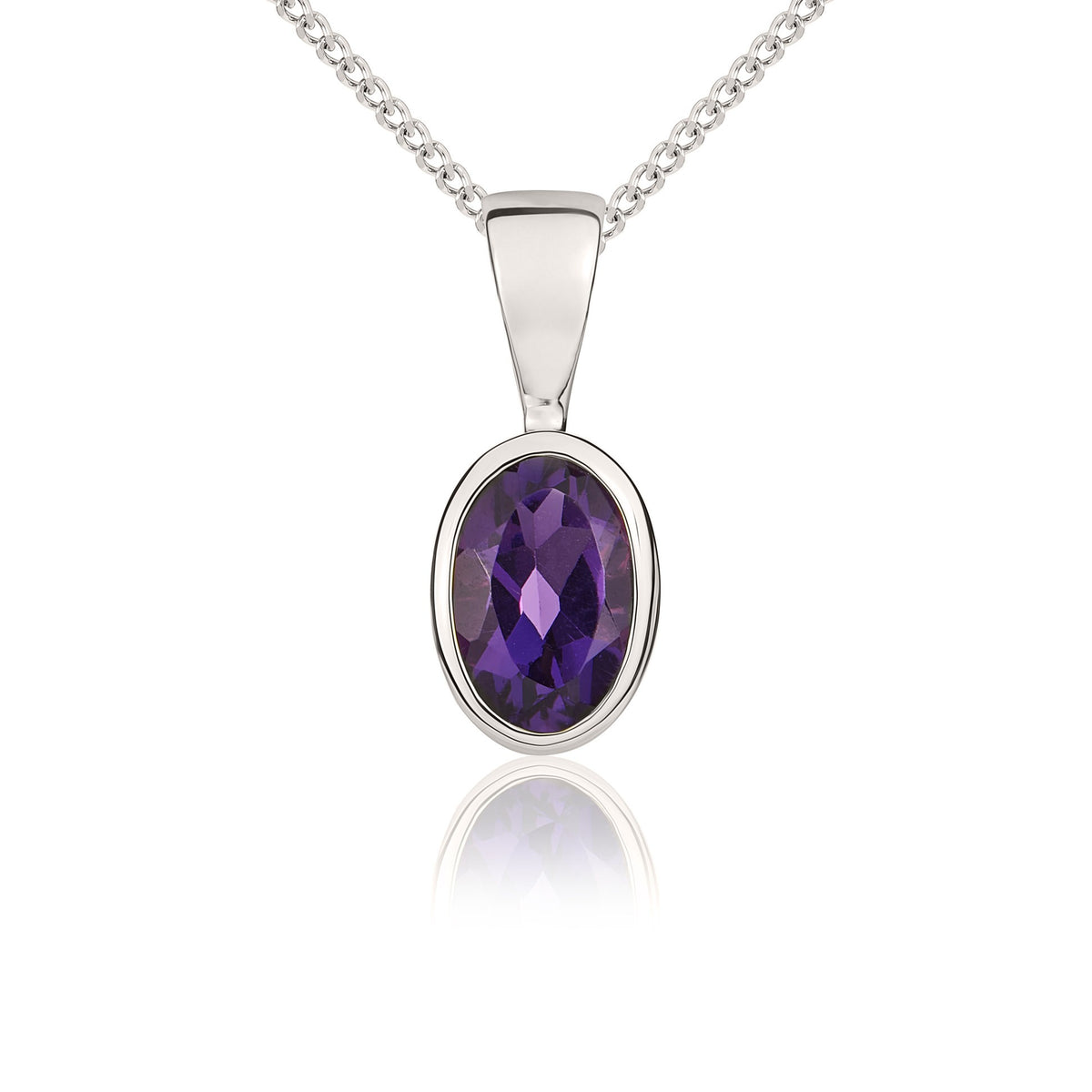 9CT WG 6X4 OVAL AMETHYST RUBOVER SET PENDANT