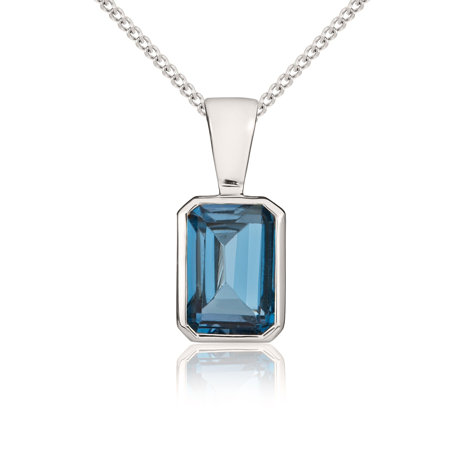 9CT WG 7X5 OCTAGON LONDON BLUE TOPAZ RUBOVER SET PENDANT