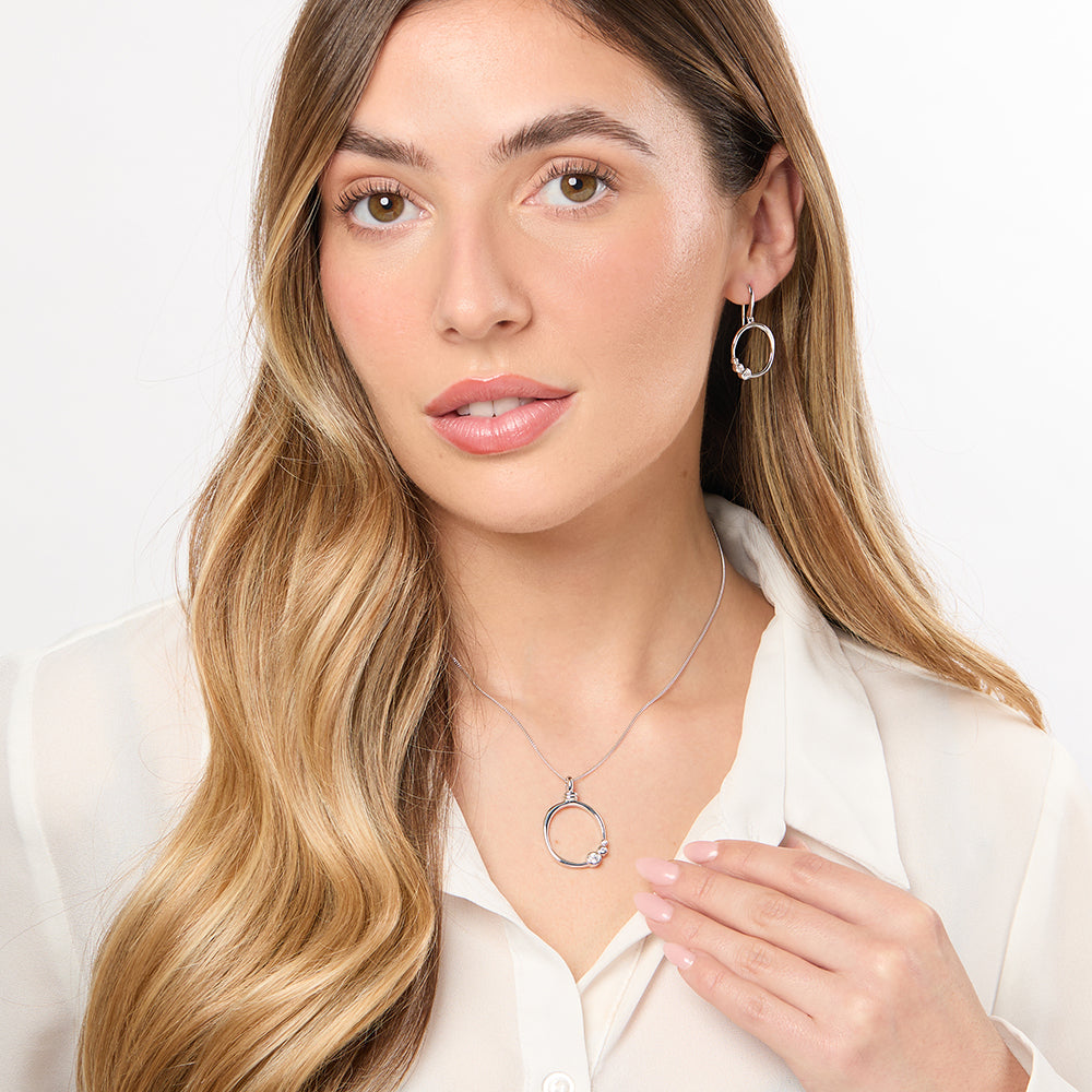 Sterling Silver Circle Pendant With Rubover Cubic Zirconia